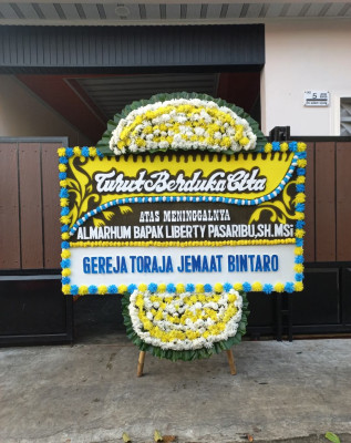 Papan Bunga Duka di Mustikajaya